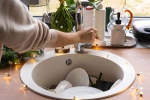 When food waste is flushed down the drain, kitchen sinks can easily clog